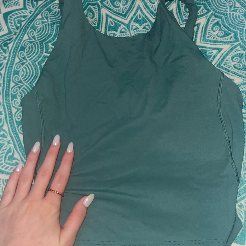 lululemon wonder train racer back tank top size 0 in forest green.